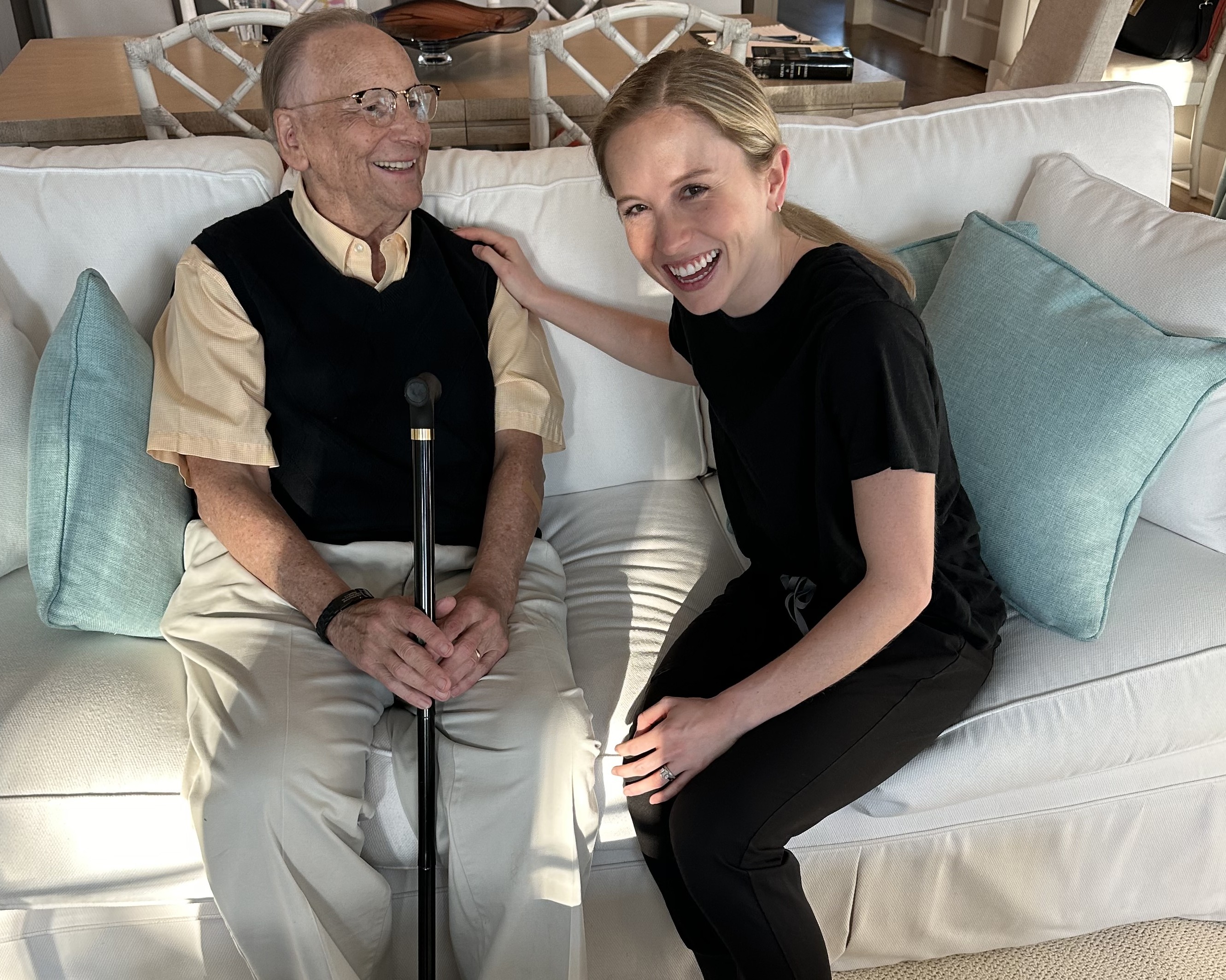 Speech therapist with an adult client in a home setting